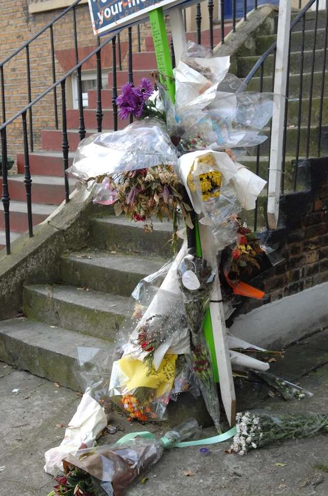 Floral tributes outside the flat in Parrock Street, Gravesend, where Edward Barry died
