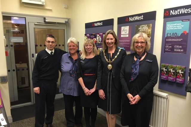 New Romney Mayor Patricia Rolfe with NatWest staff on the closing day of the town branch.