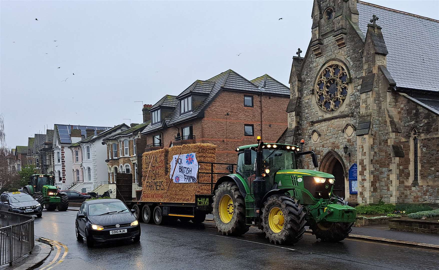Farmers protesting government policy passing St Paul's Roman Catholic Church, Dover