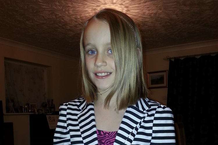 Emma Walker after having her hair cut for the Little Princess Trust
