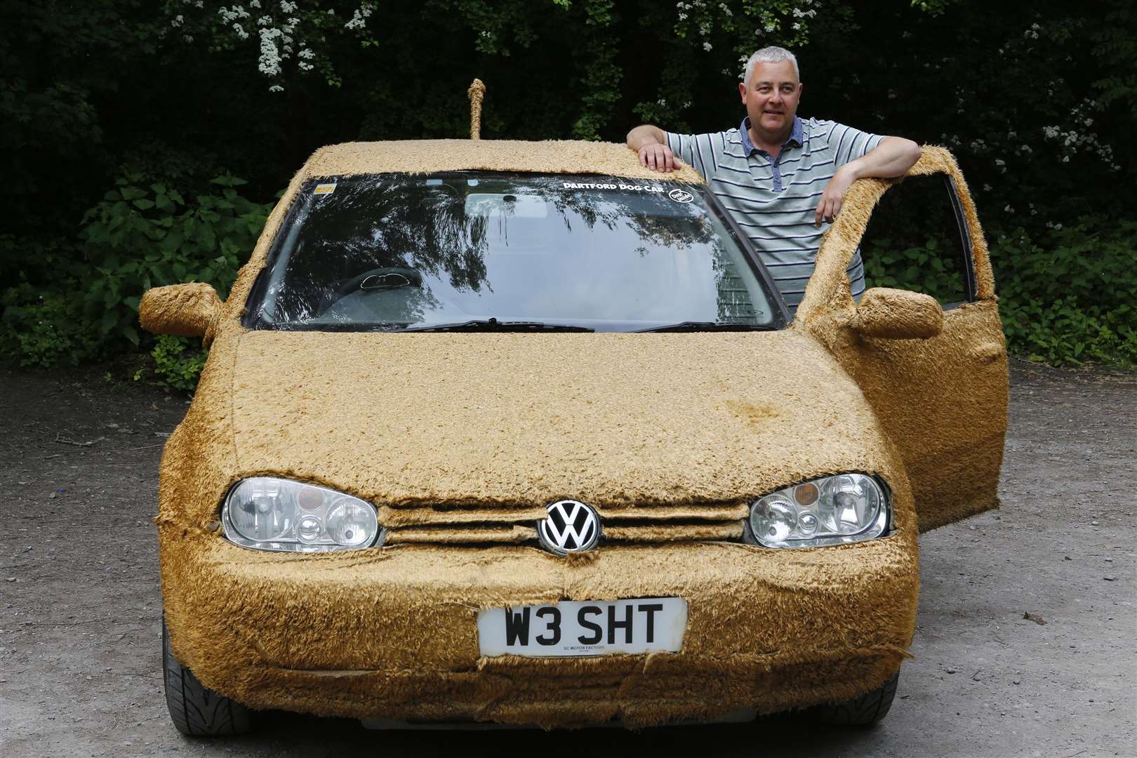 Justin Scrutton has decorated his car with fur to make it into the perfect vehicle to transport his dogs