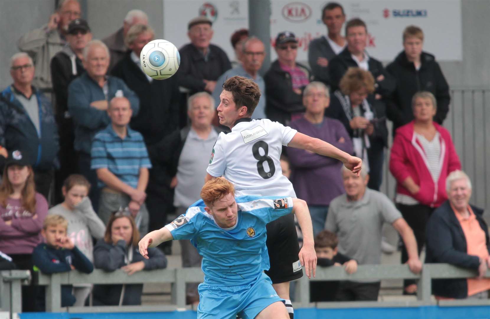 Lee Noble wins the ball in the air on his return to the Dartford side against East Thurrock on Monday. Picture: John Westhrop