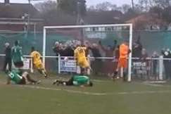Cray Valley goalkeeper Jordan Carey headbutting the post against Ashford United. Picture: Dave Jones