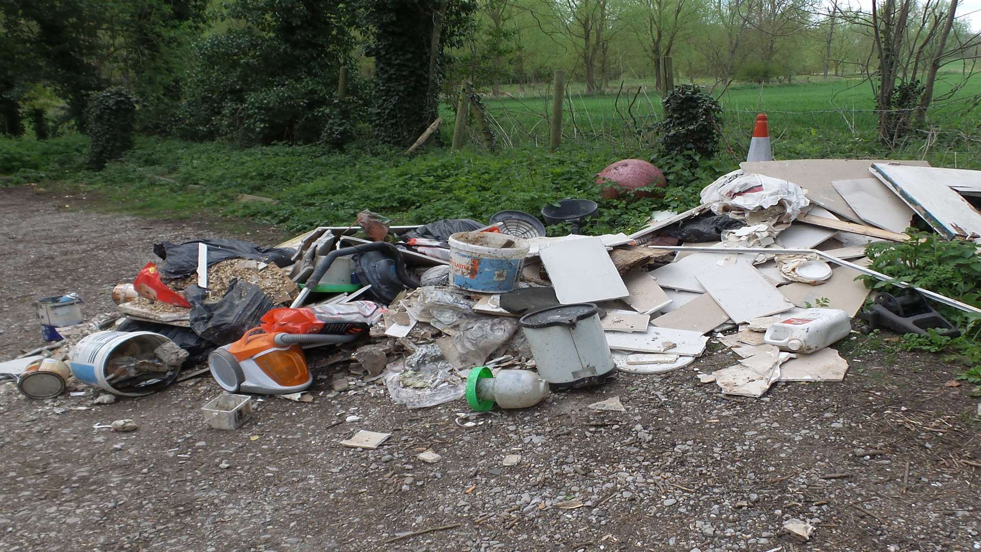 A huge pile of rubbish - including toxic chicken manure - was dumped outside Eastwell