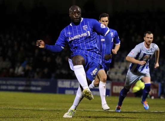 Adebayo Akinfenwa scores a penalty for the Gills Picture: Barry Goodwin