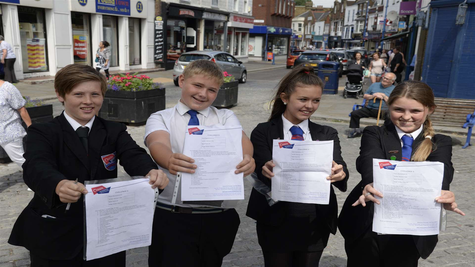 Oasis Isle of Sheppey Academy pupils Jordan Skinner, 15, Dane Blackstock, 12, Belle Peck, 12 and Paige Ashby-Clark, 12 on 'The Apprentice' challenge in Sheerness High Street