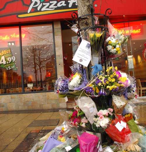 Floral tributes have been left outside the restaurant. Picture: NICK JOHNSON