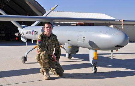 Lance Bombardier Stuart Brauninger with a British military drone