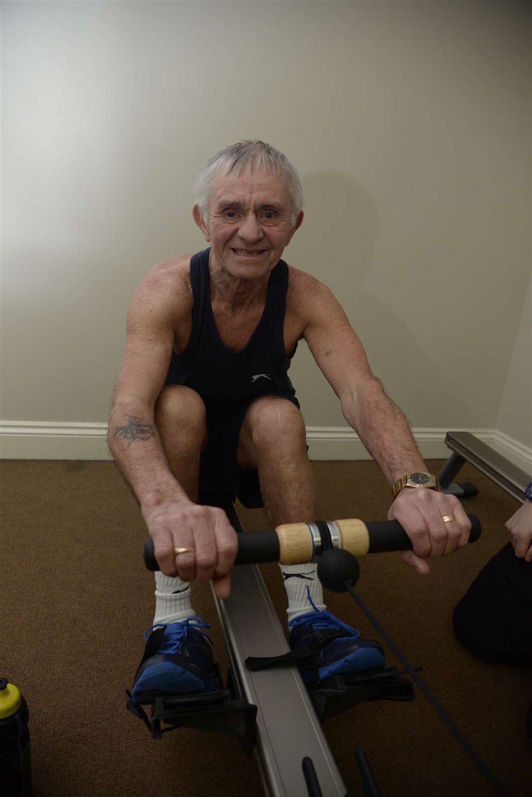 James Rutter on a rowing machine