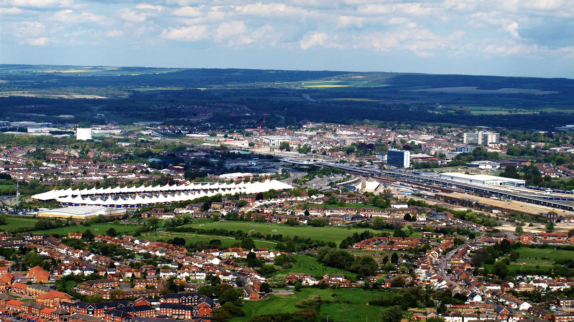 An aerial view of Ashford, with the Designer Outlet to the left, the International Station in the centre, next to International House, with the Panorama to the right