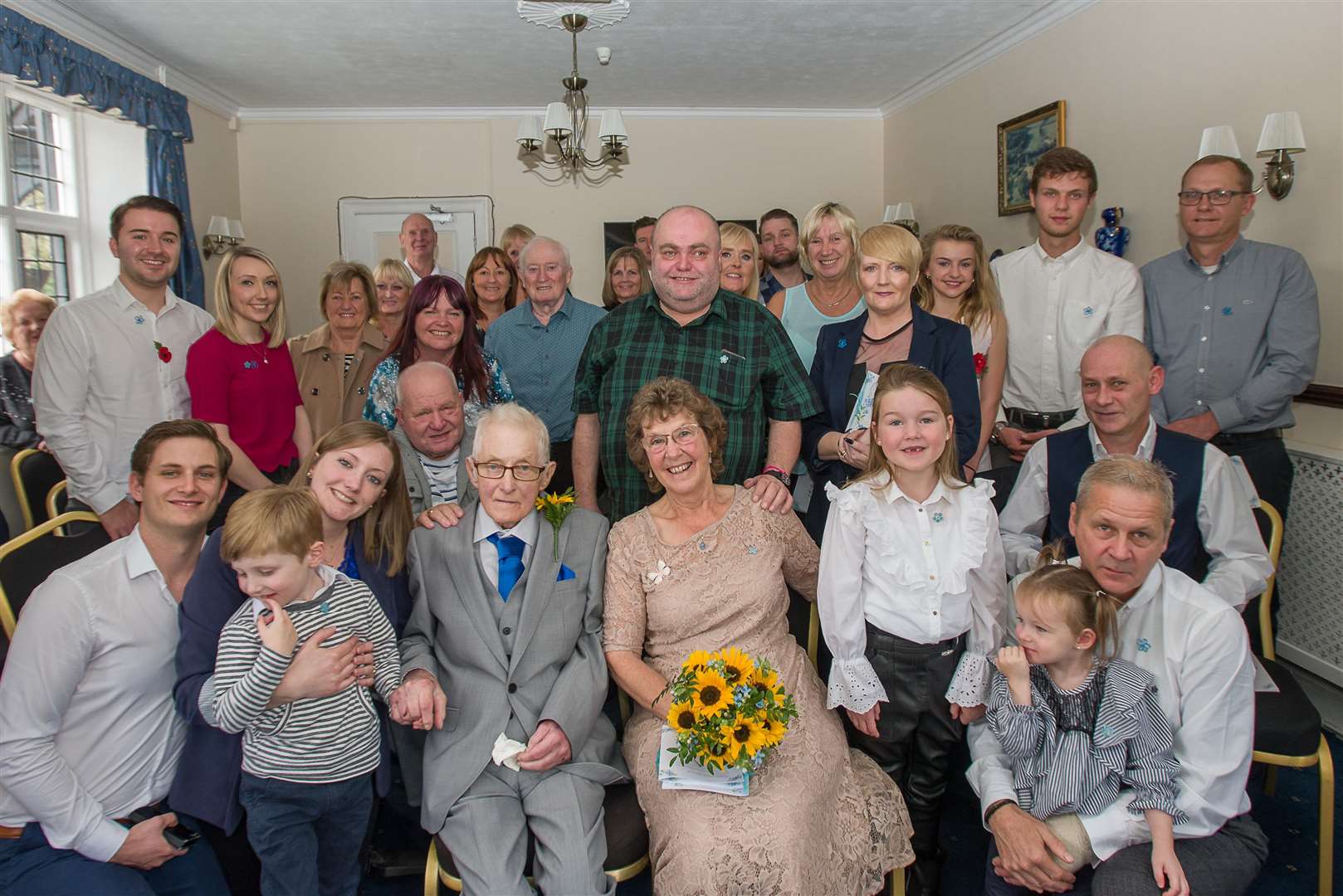 Charlie and Judy with their friends and relatives
