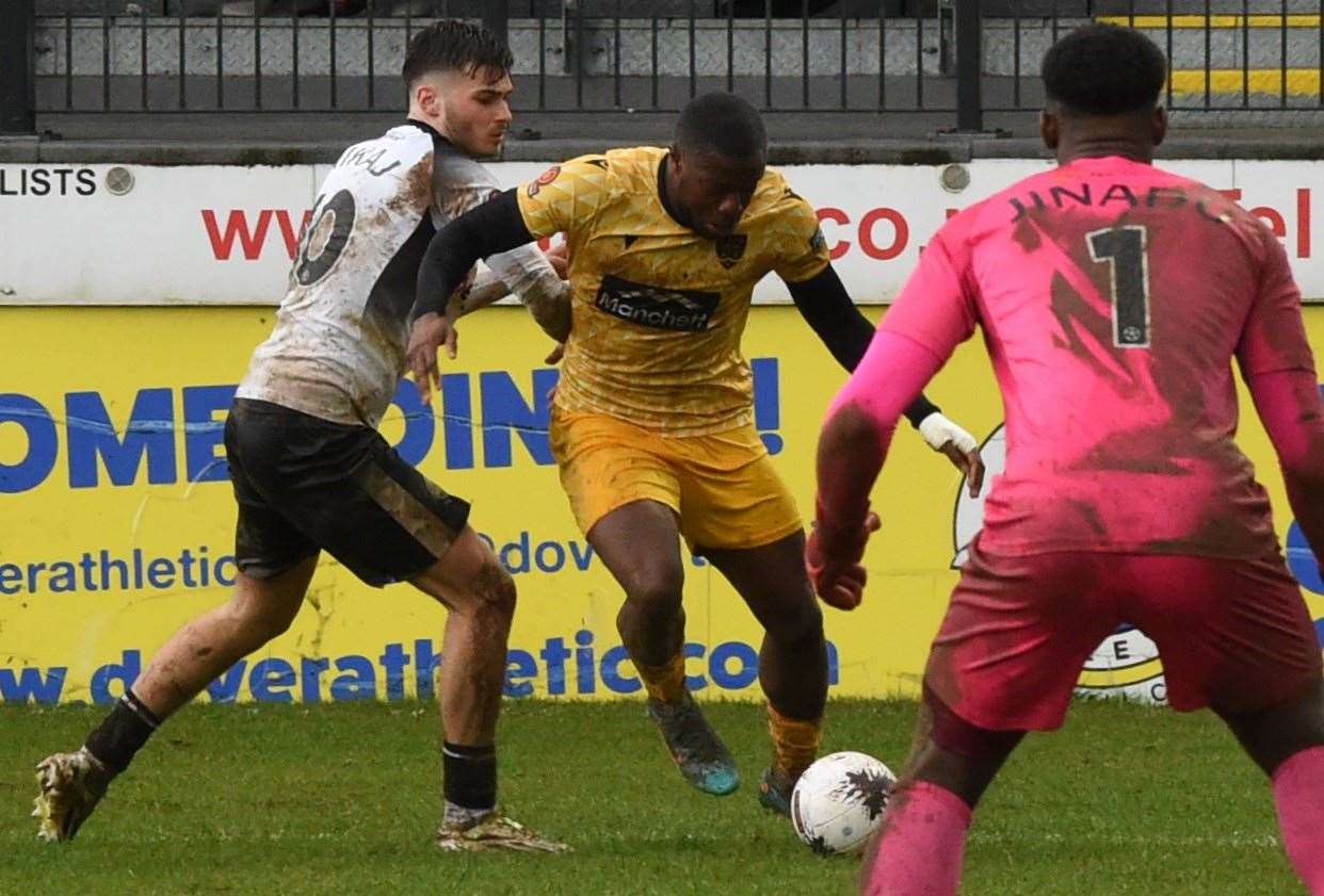Chi Ezennolim gets away from Dover's George Nikaj and sets up Jephte Tanga's winning goal for Maidstone. Picture: Steve Terrell