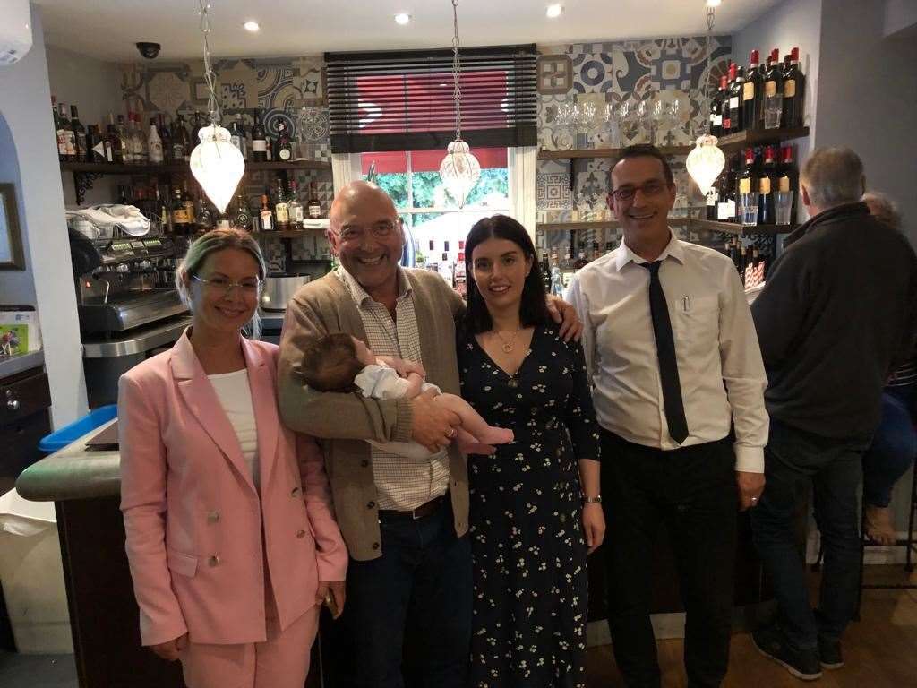 Anna Sciacca, Gregg Wallace holding baby Sid, his wife Anne-Marie and Montalbano waiter Massimo
