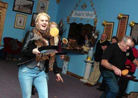 Emily Pettley joins in the pancake race