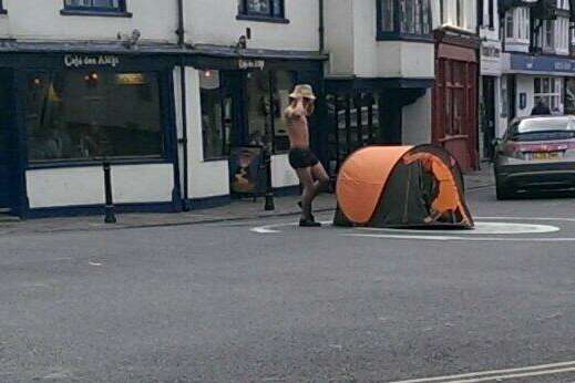 Half naked camper spotted on the roundabout close to St Dunstans Street. Picture by Neil Haffenden.