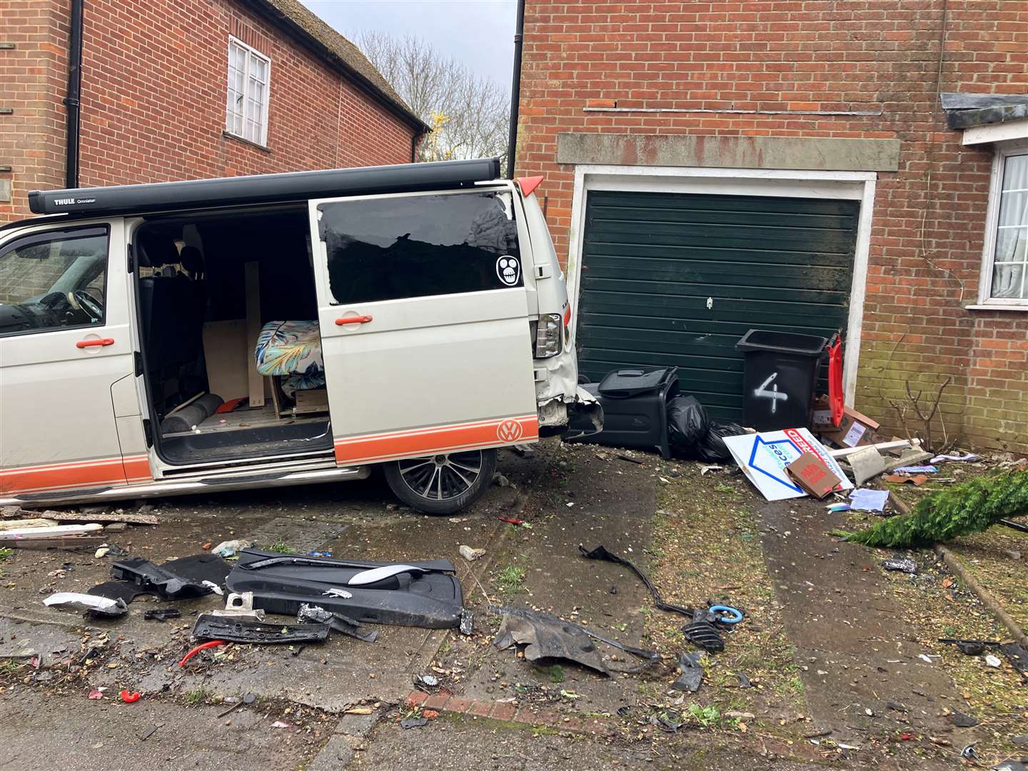 The family's van was one of the parked vehicles damaged in the crash