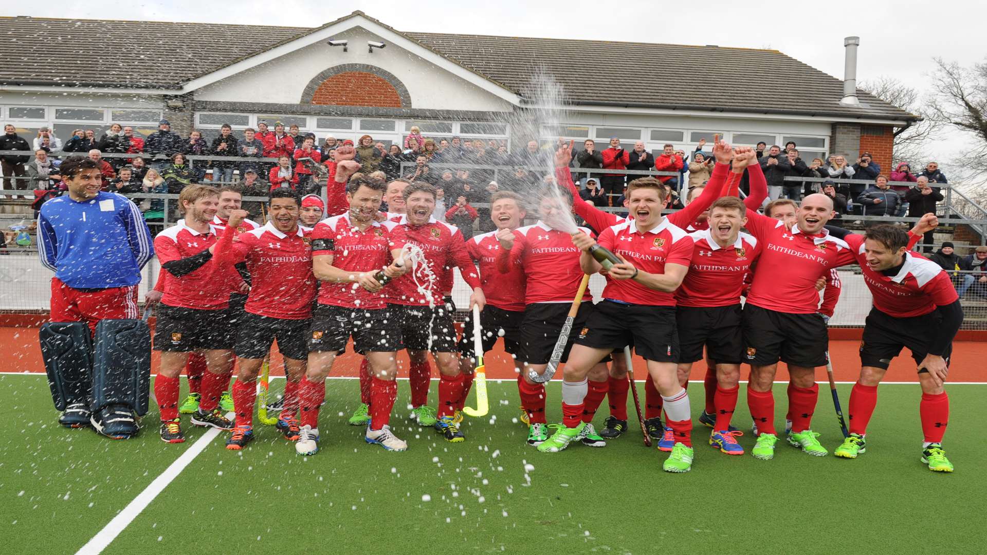 Holcombe celebrate their title win Picture: Steve Crispe