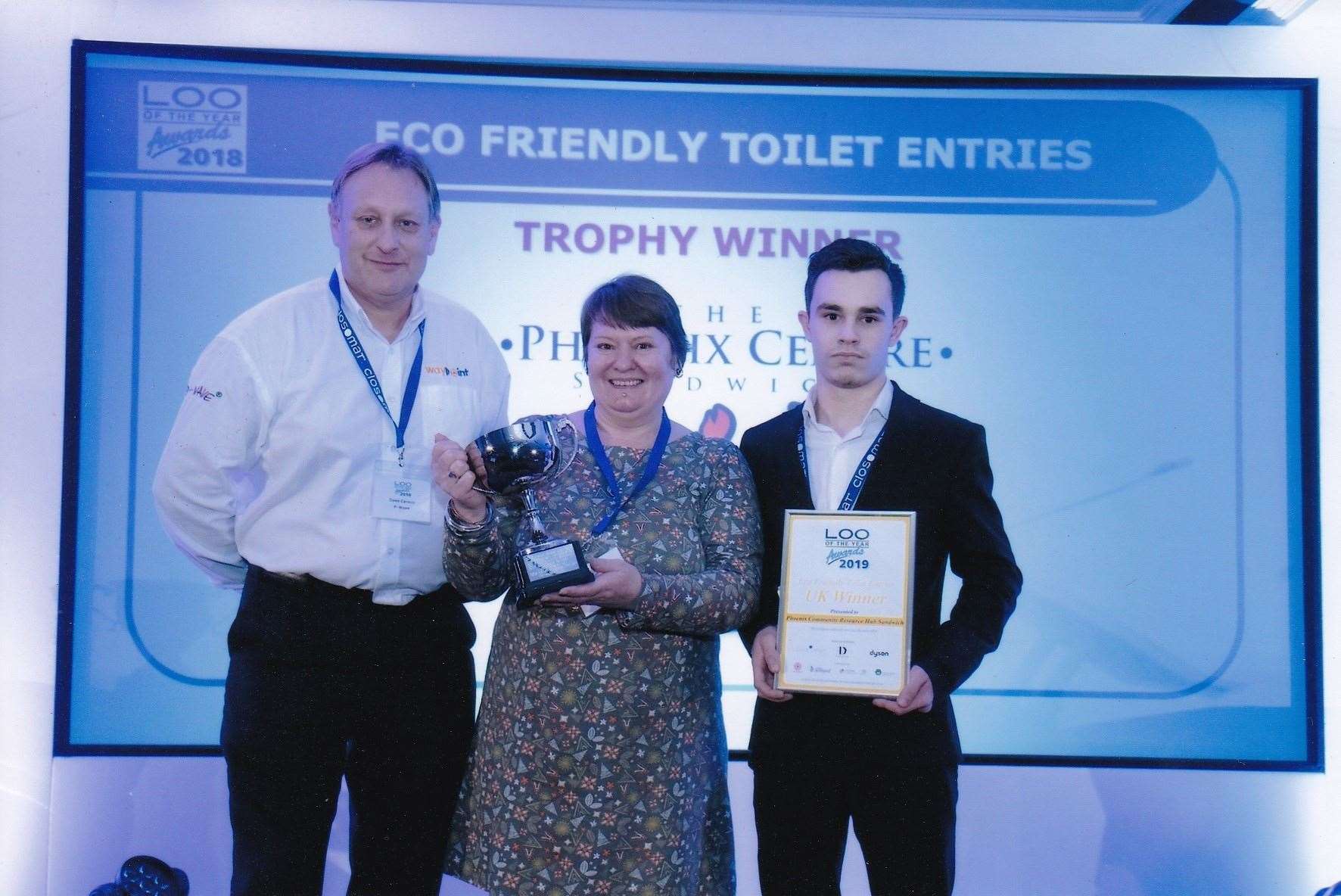 CEO ClosMat presents the award to Elleanor Scott (middle) and Jack Beadle (left)