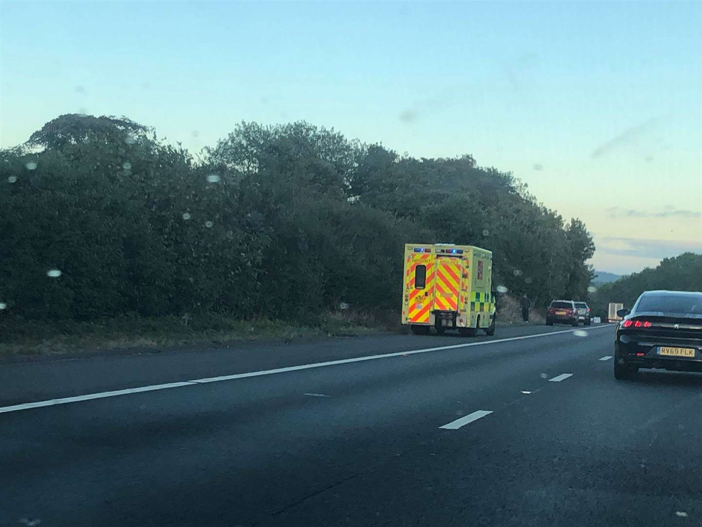 An ambulance at the side of the M2 after a crash this evening (16451879)