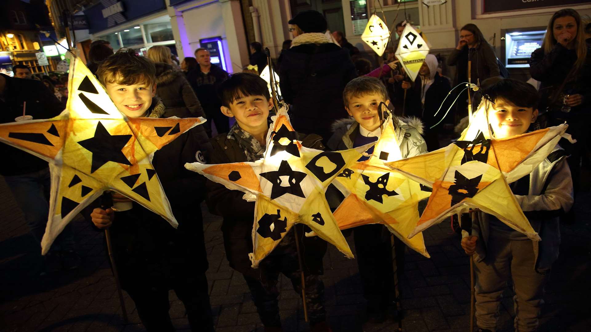 Children enjoying the parade through the town centre.