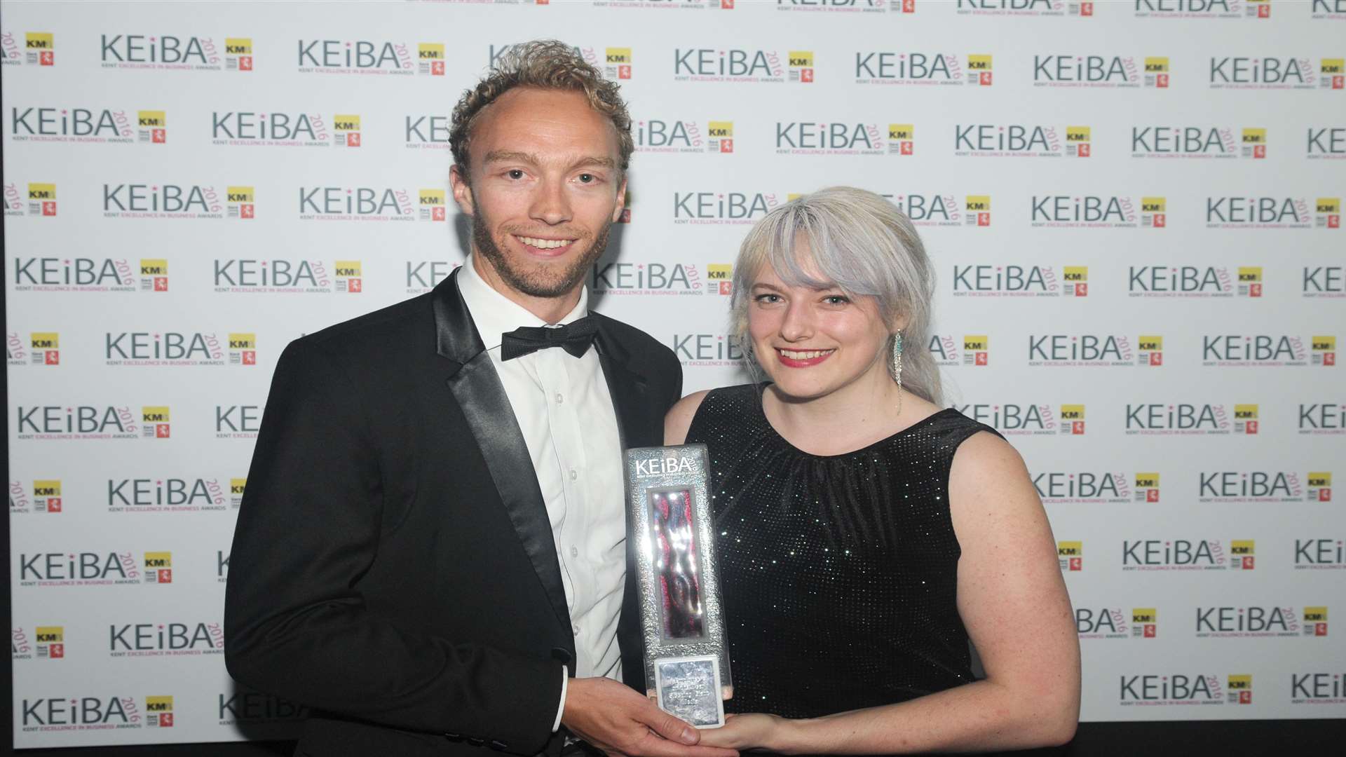 Luke Quilter and Nell Sanders from Sleeping Giant Media with the company's Employer of the Year award