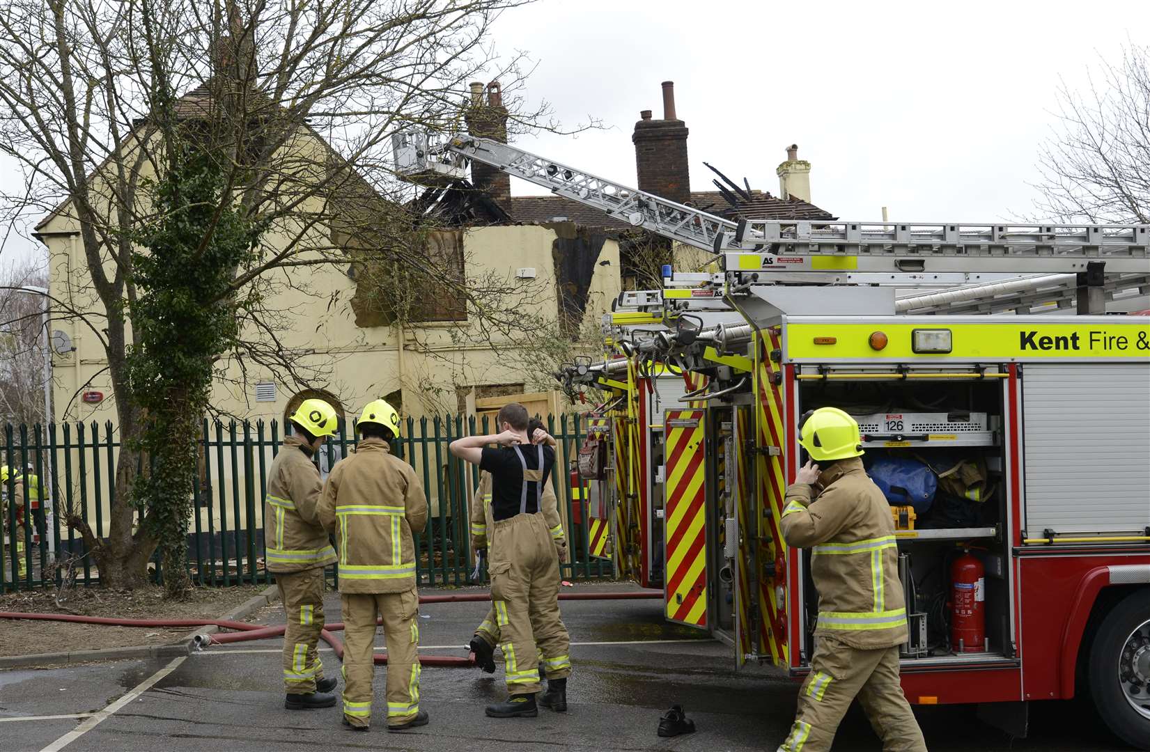 Firefighters damping down at the scene of the blaze in 2014