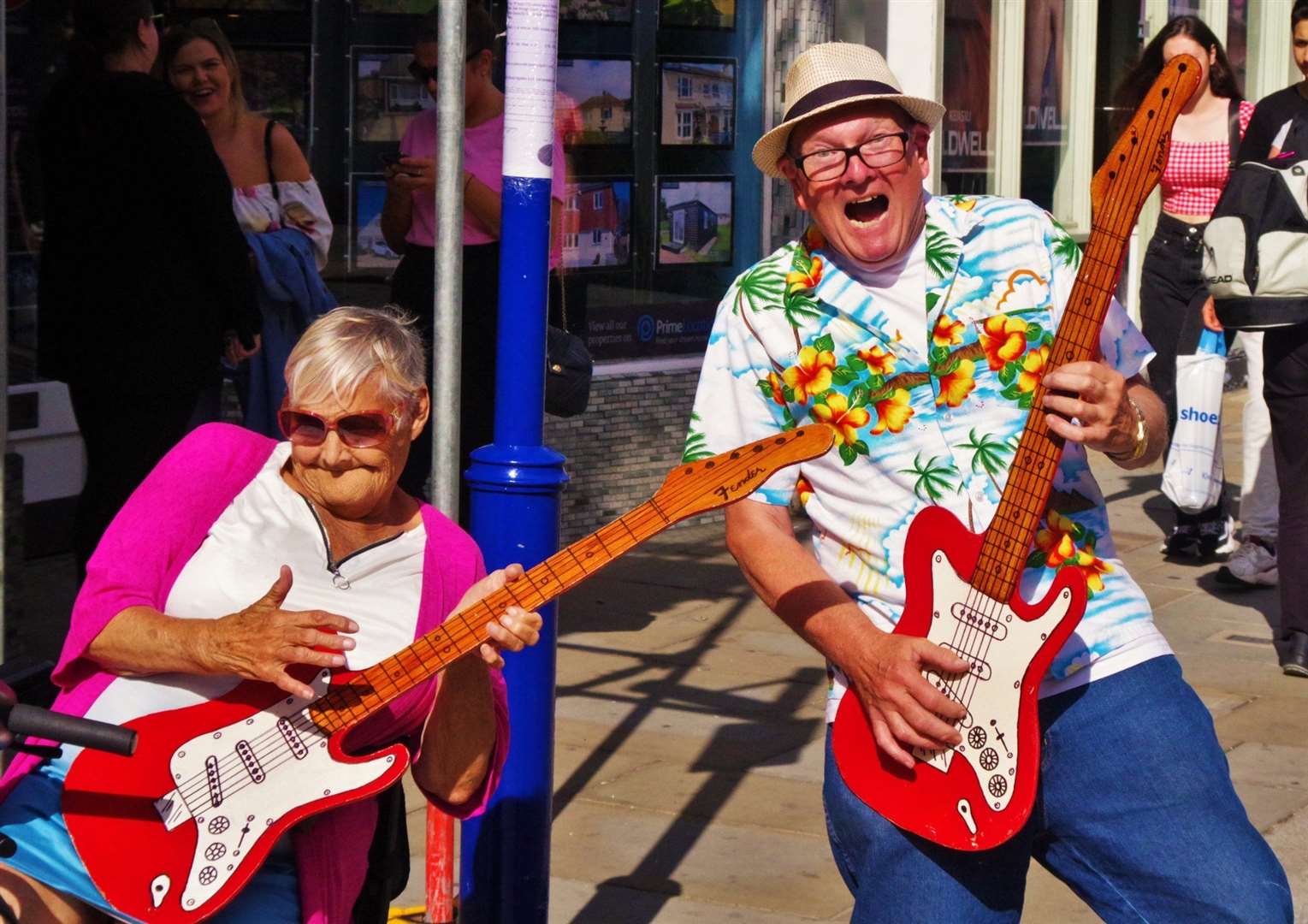 John Nurden and music fan Kathleen have a blast on the air guitar at Free Music Friday in Sheerness Broadway. Picture: Phil Crowder