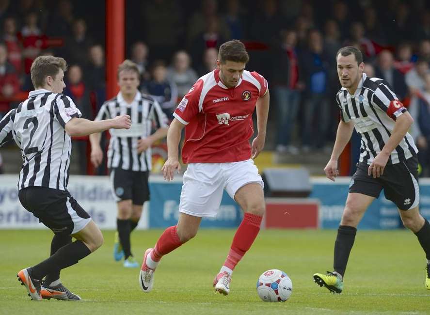 Michael Thalassitis takes on the Dorchester defence at Stonebridge Road Picture: Andy Payton