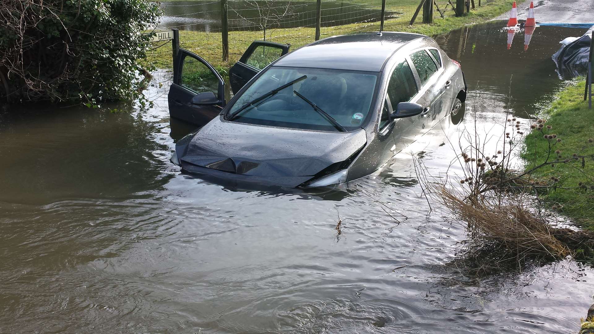 A driver who ignored the 'road closed' signs at Patrixbourne got into deep water