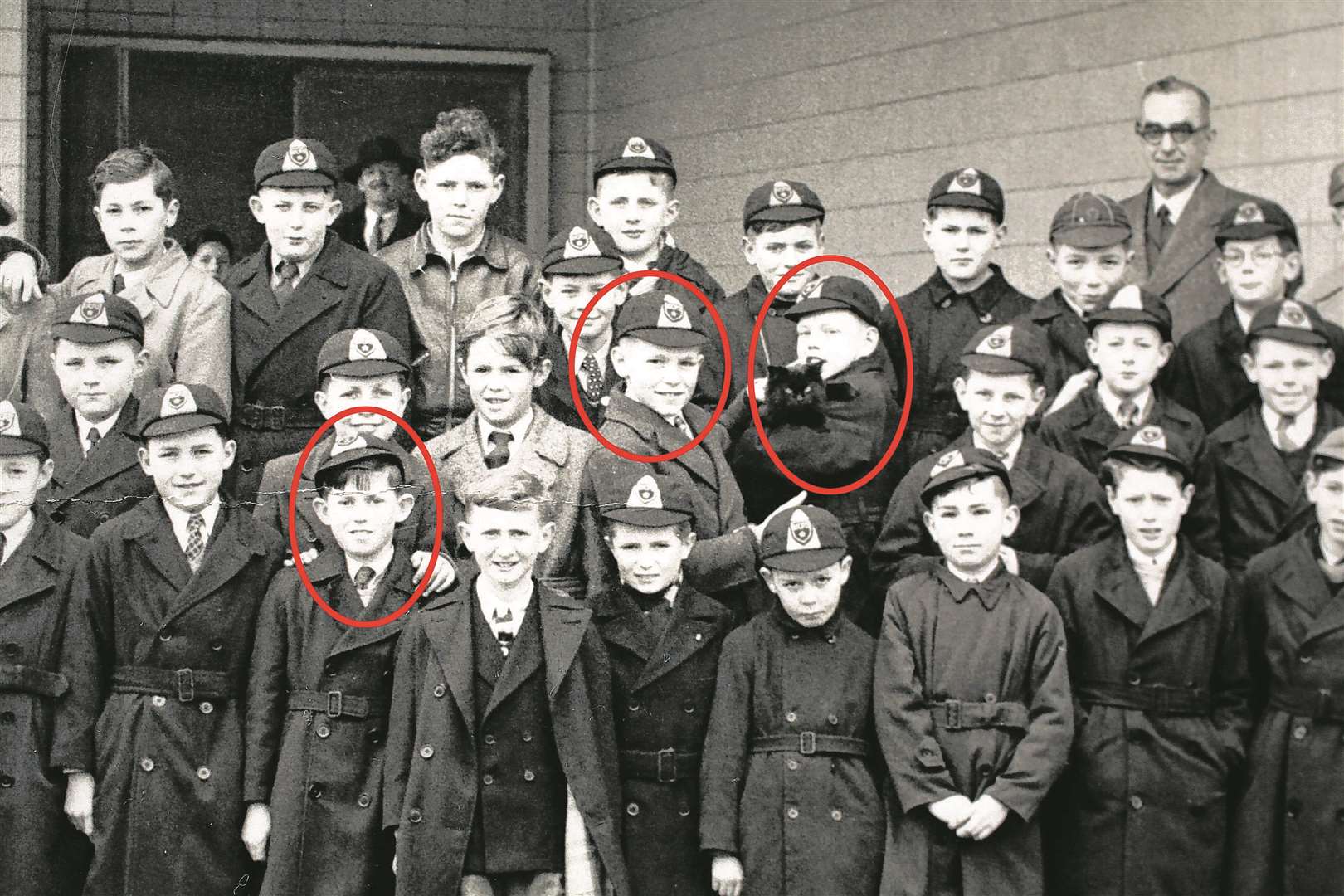 Keith Richards (bottom row 3rd from left), Mick Jagger (right of centre, holding a black cat), Peter Holland (immediatly to the left of Mick Jagger). Picture taken in 1954 at Wentworth School, Dartford.