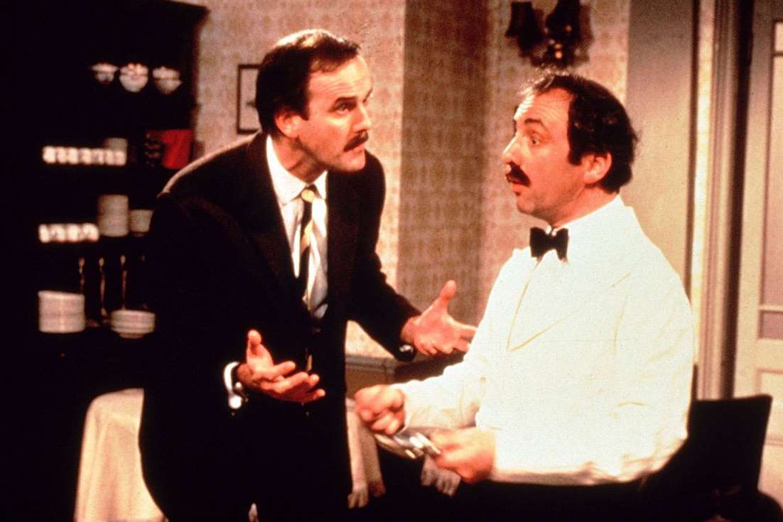 Faulty Towers with John Cleese as Basil Fawlty and Andrew Sachs as Manuel