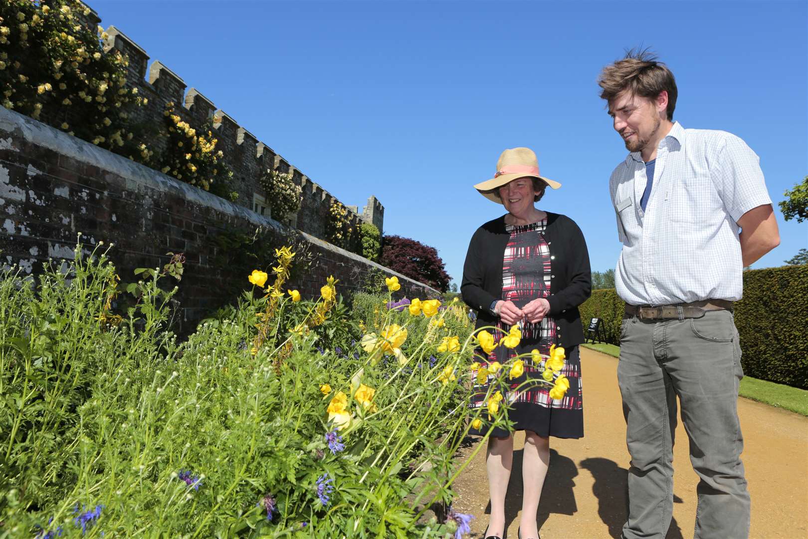 Lady De L'Isle and head gardener Cory Furness look at the revived Blue and Yellow border at Penshurst Place
