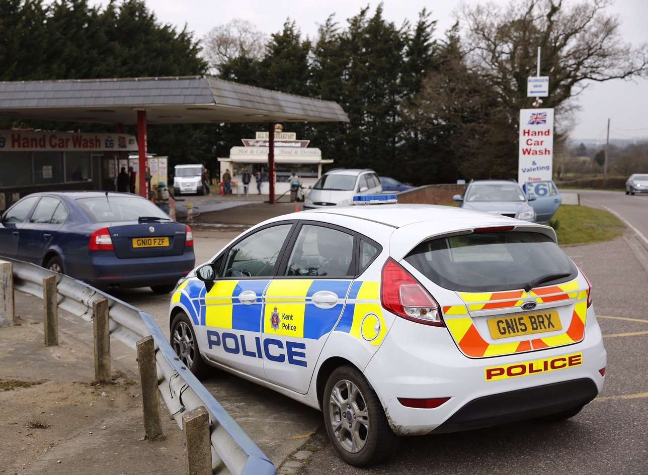 Police outside the hand car wash on Headcorn Road