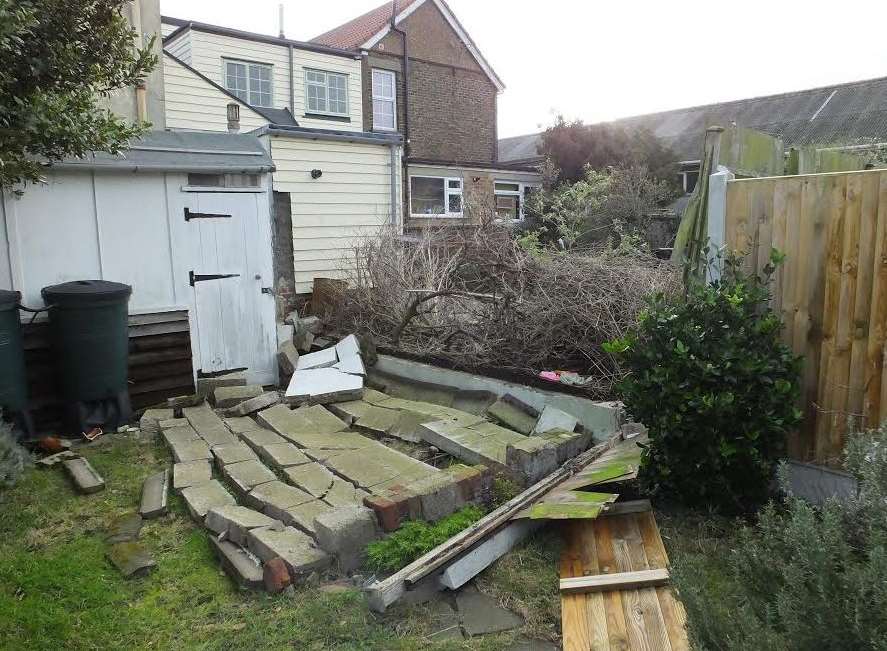 The 7ft wall in Mr and Mrs Chapman's garden in Deal