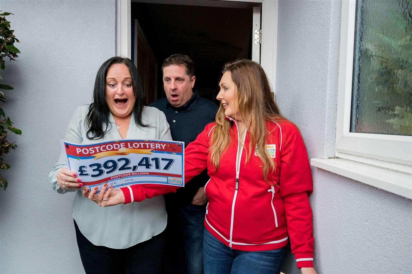 Judy Eastwood, 57, and partner Scott Wood won over £392,000 after their postcode - CT14 9PR - in Deal, was announced as the winner of a massive People’s Postcode Lottery prize. Ambassador Judie McCourt presented the cheque. Picture: People's Postcode Lottery
