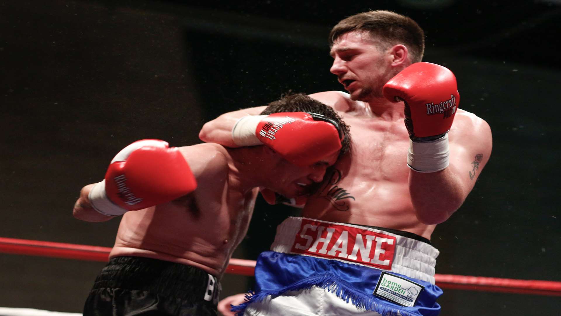 Charlie Shane (blue shorts) on his way to victory over Liam Griffiths at Maidstone Leisure Centre Picture: Matthew Walker