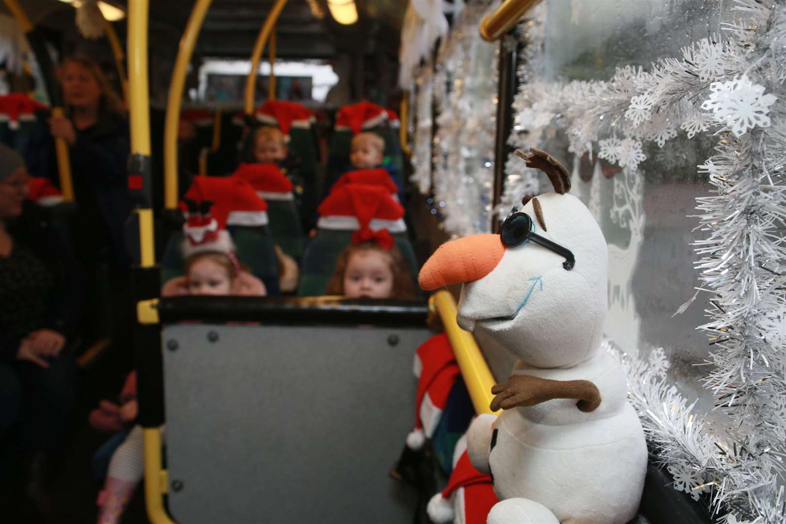 Olaf the snowman said hello to passengers as they got on. Picture: Phil Lee