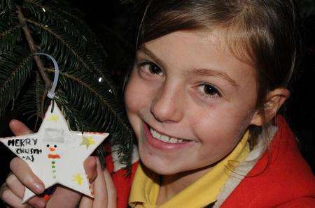Bella Daly, nine, from Reculver, was among those to decorate the tree