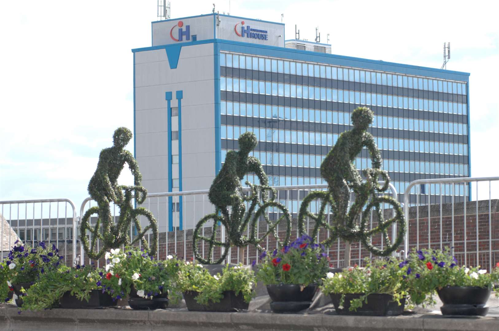 Cyclist topiary, with Ashford's International House in the background