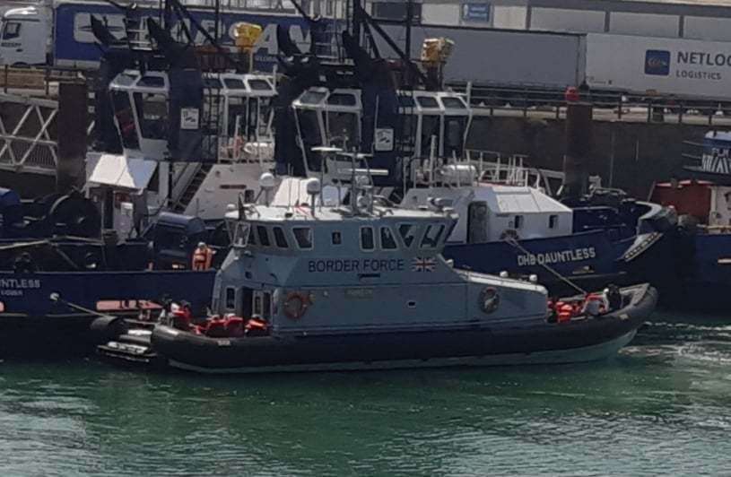 Scores of suspected asylum seekers are brought ashore on a Border Force patrol vessel on Tuesday. Pictures Sam Lennon KM Group