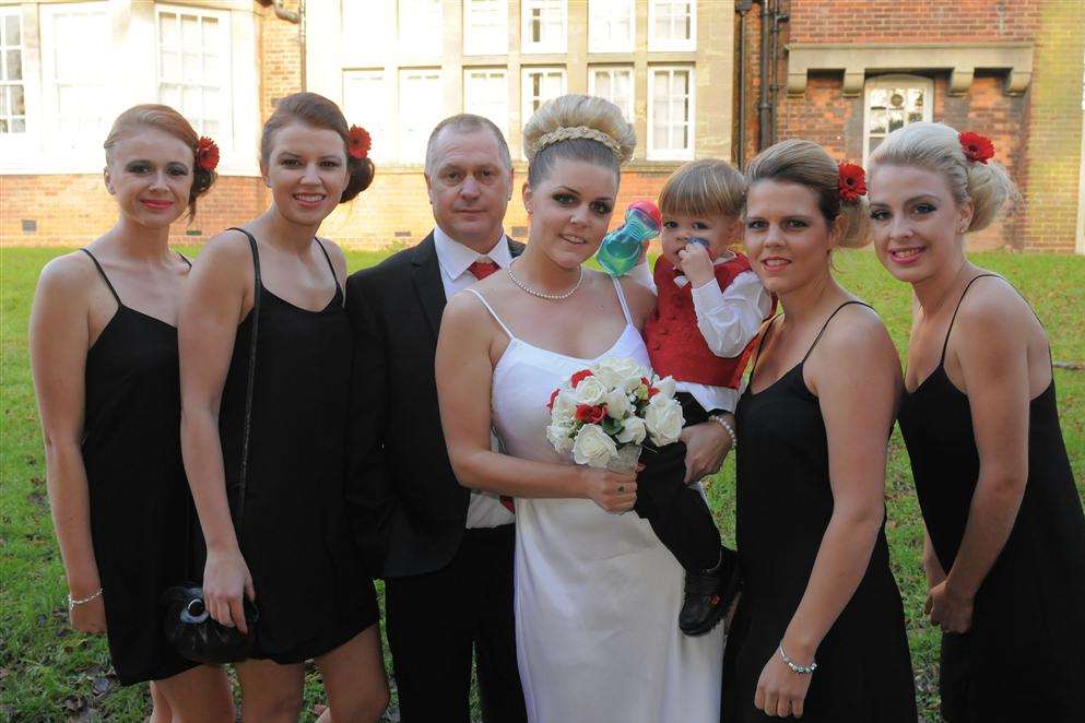 Bride Cola Weller with son Ralph, her father Perry and bridesmaids
