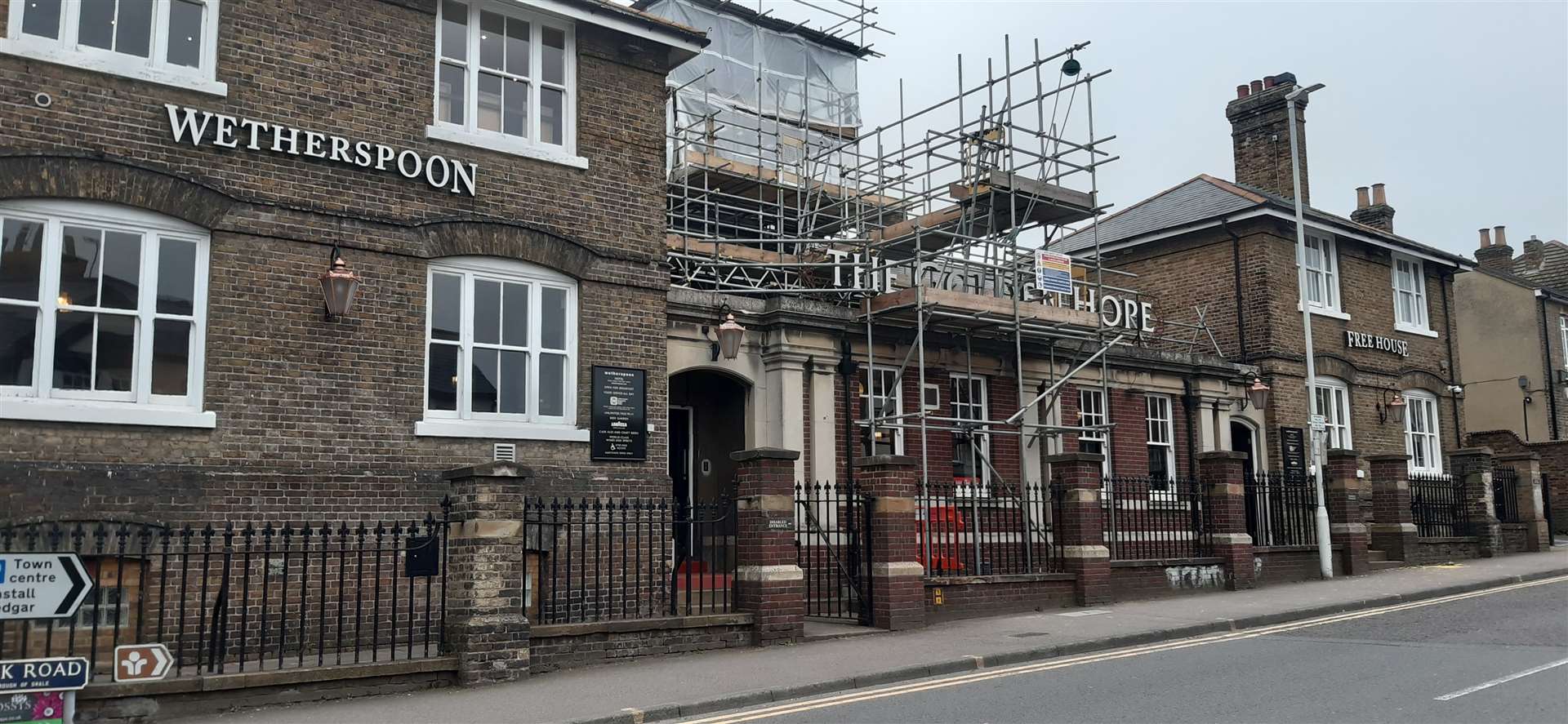 The Golden Hope pub has scaffolding up as builders fix its leaking dome window
