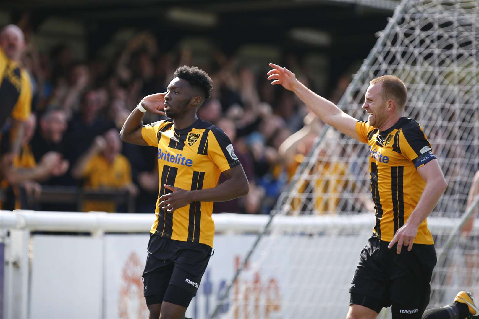 Stuart Lewis rushes to congratulate Blair Turgott after his goal Picture: Andy Jones