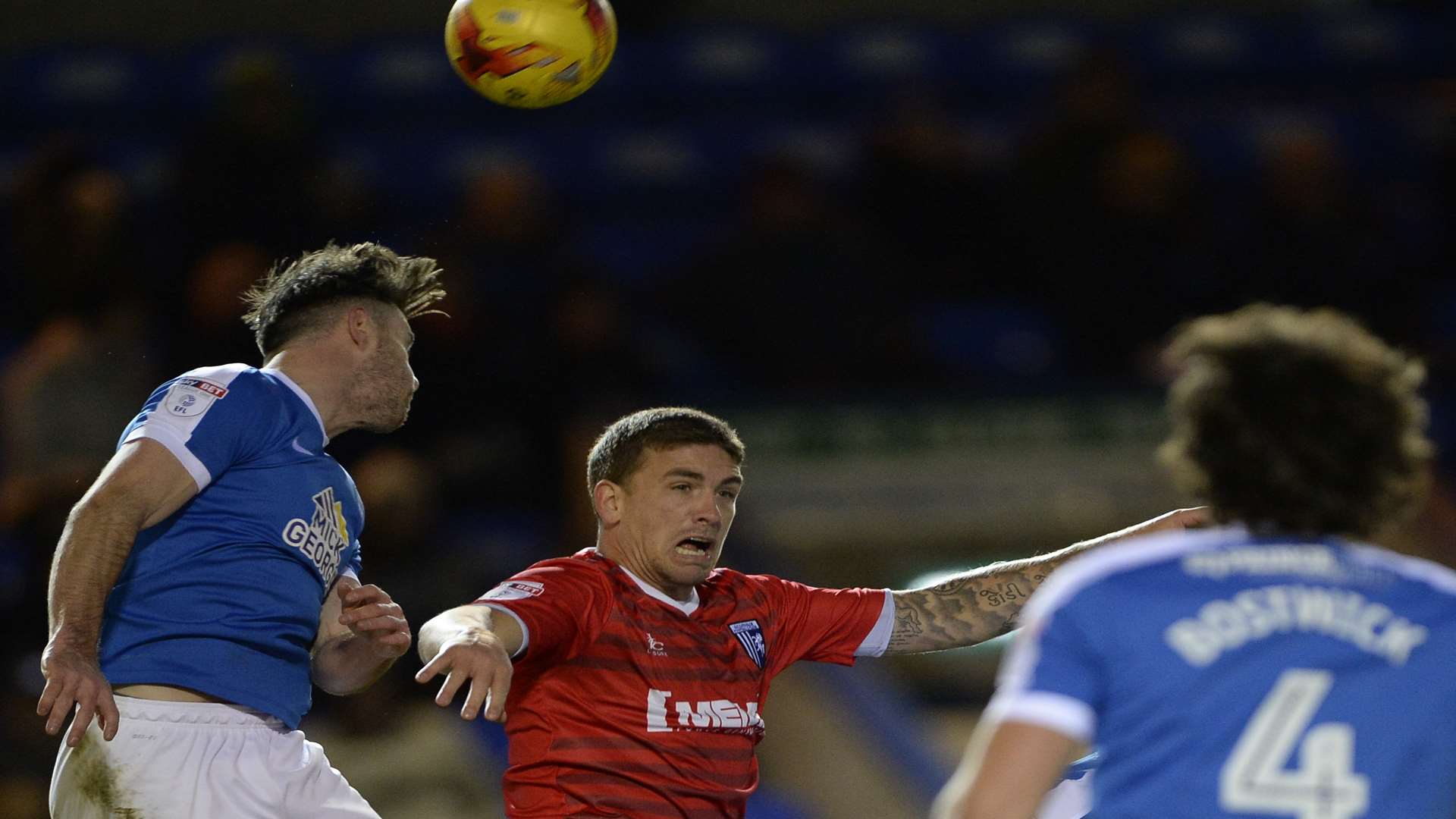 Cody McDonald does aerial battle against the Posh defence Picture: Ady Kerry