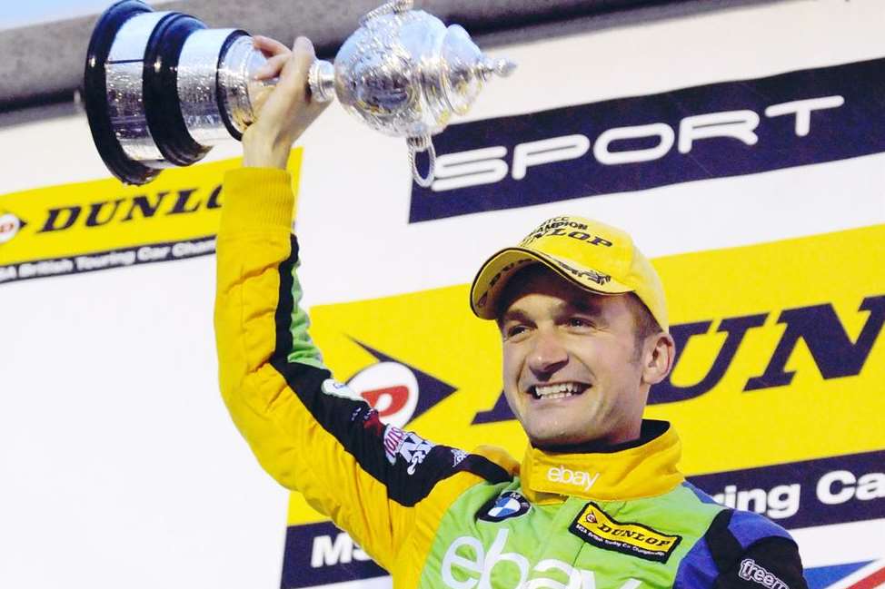 Delight for Colin Turkington, as he collects his second BTCC title. Picture: Simon Hildrew