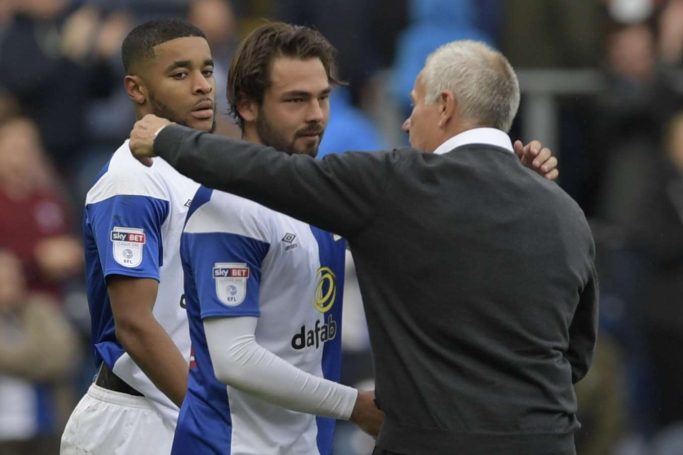 Interim Gills boss Peter Taylor hugs Bradley Dack at the final whistle Picture: Barry Goodwin