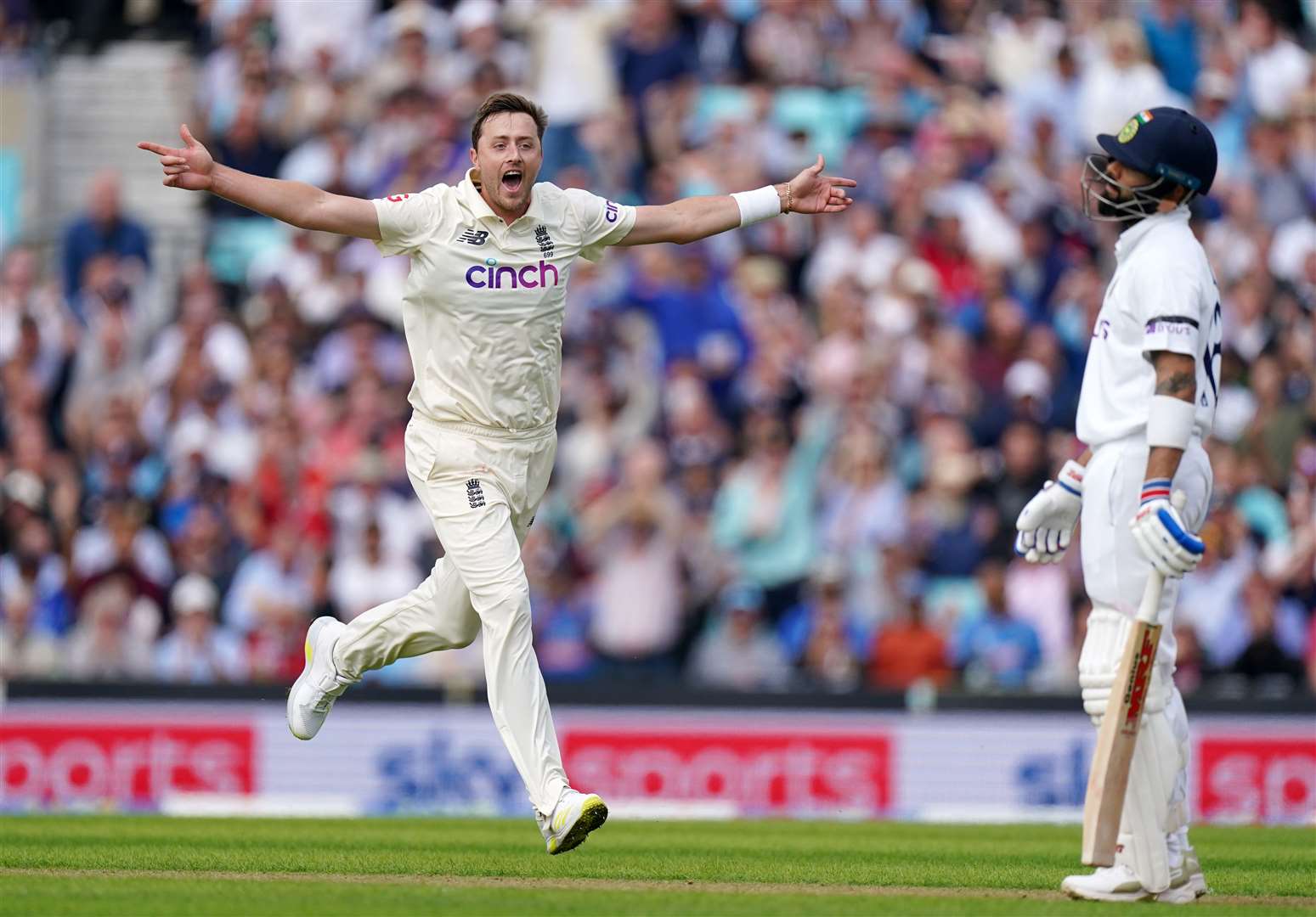 England's Ollie Robinson celebrates the wicket of India's Virat Kohli during day one of the Fourth Test at the Oval Picture: Adam Davy/PA Wire/PA Images