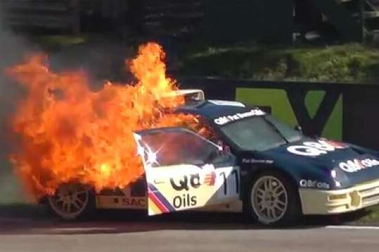 Pat Doran's classic Ford RS200 ablaze at Lydden Hill circuit. Picture: allthekasparas/YouTube