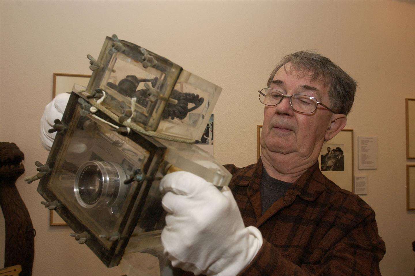 Don inspects a camera at Whitstable Museum in 2005