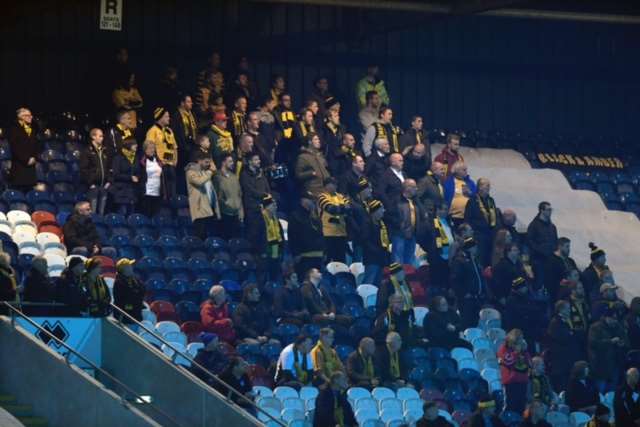 Travelling Maidstone fans get behind their team Picture: Barry Goodwin